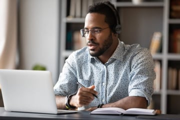 man-laptop-headset